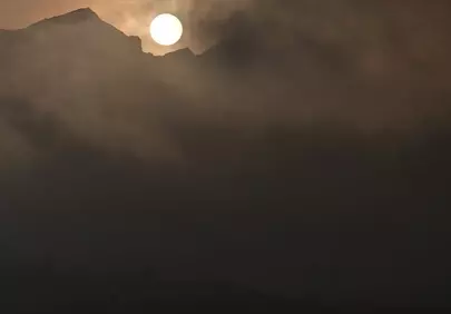 Breathtaking Mountain Sunset: Serene Lake Twilight Glow