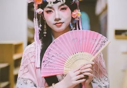 Enchanting Oriental Beauty: Traditional Garb and Butterfly Headdress