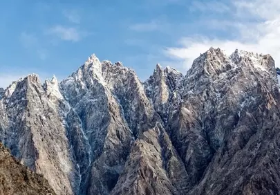 Majestic Passu Cones: Karakoram's Snow-Capped Peaks
