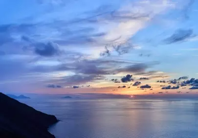 Breathtaking Mediterranean Sunset Over Serene Waters