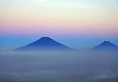 Breathtaking Mountain Sunrise Above the Clouds Panorama
