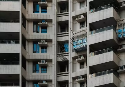 Towering Urban Density: Modern Apartment Building Facade