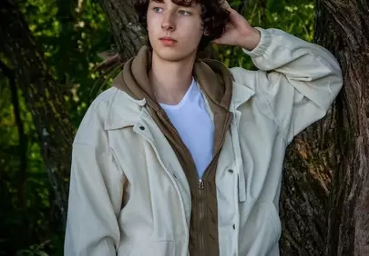 Serene Youthful Contemplation Amidst Nature's Embrace