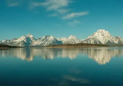 Breathtaking Teton Peaks Reflected in Tranquil Jackson Lake