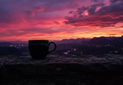 Breathtaking Sunset View with Coffee Mug Silhouette