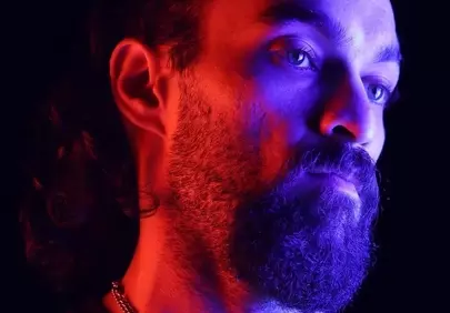 Dramatic Blue & Red Lit Man Portrait on Black Background