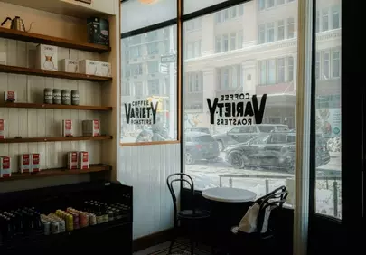 Charming Urban Coffee Shop Interior with Cozy Seating