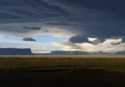 Dramatic Icelandic Prairie Under Threatening Storm Clouds