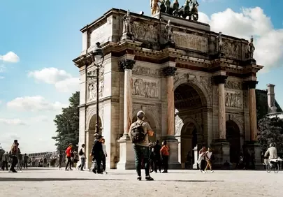 Majestic Carrousel Arch: Parisian Grandeur Under Blue Skies