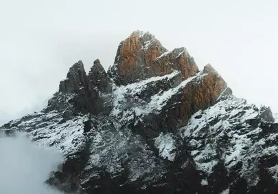 Majestic Snow-Kissed Peaks: A Serene Alpine Masterpiece