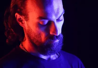 Dramatic Blue and Red Light Portrait of a Bearded Man