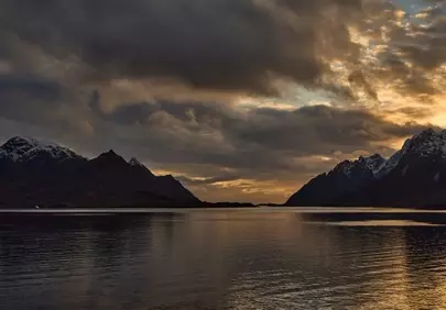 Dramatic Nordic Sunset Over Calm Bay