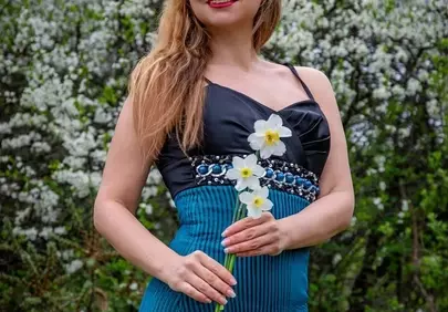 Stunning Spring Beauty: Woman with Daffodils in Bloom