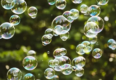 Sparkling Bubbles: Playful Iridescence in Summer Sunlight