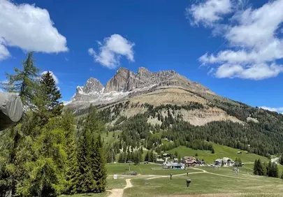 Breathtaking Dolomites Vista: Majestic Peaks Under Summer Skies