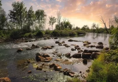 Breathtaking Sunset Over Serene River Landscape