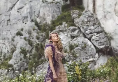 Stunning Fashion Amidst Majestic Mountain Scenery