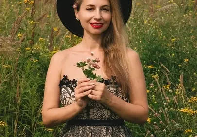 Enchanting Summer Portrait: Blonde Beauty in Wildflower Meadow