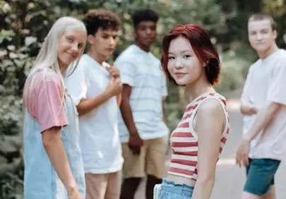 Vibrant Youthful Gathering: Diverse Teens Enjoying Nature's Embrace