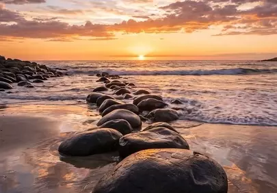 Breathtaking Sunset Over Serene Beach Stones