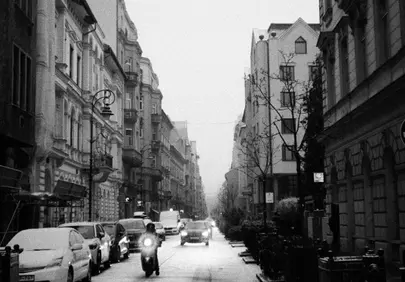 Timeless Winter Cityscape: Snowy Street in Grayscale Film