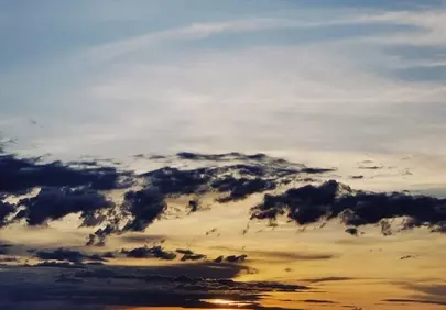 Breathtaking Ocean Sunset: Golden Hues Meet Serene Waters