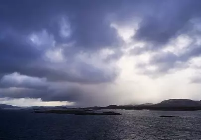 Dramatic Dawn: Hope Amidst a Stormy Sea Landscape