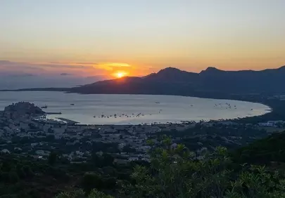 Breathtaking Calvi Sunrise: Orange Sky Over Mediterranean Coast