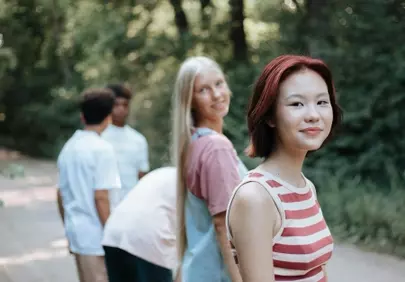 Vibrant Youth: Diverse Teens Smiling in Nature