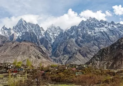 Majestic Karakoram Peaks: Serene Village Life in Spring