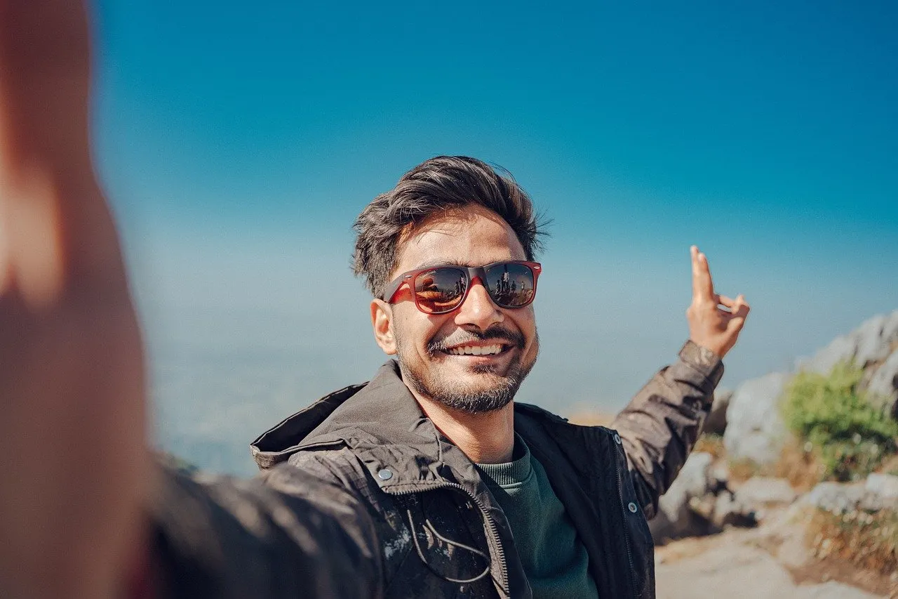 Thrilled Mountain Hiker Captures Epic Summit Selfie