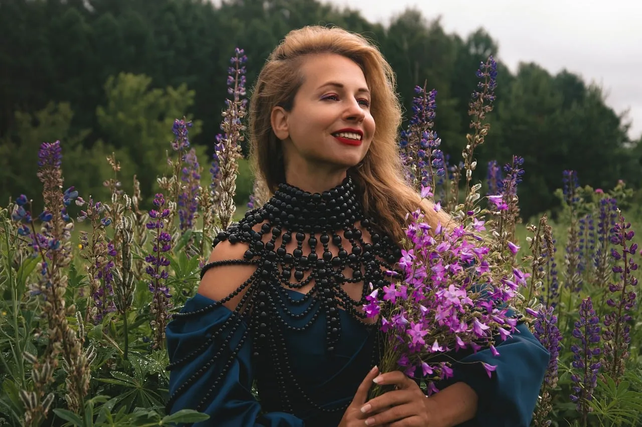 Enchanting Summer Blossom: Woman in Lupine Field
