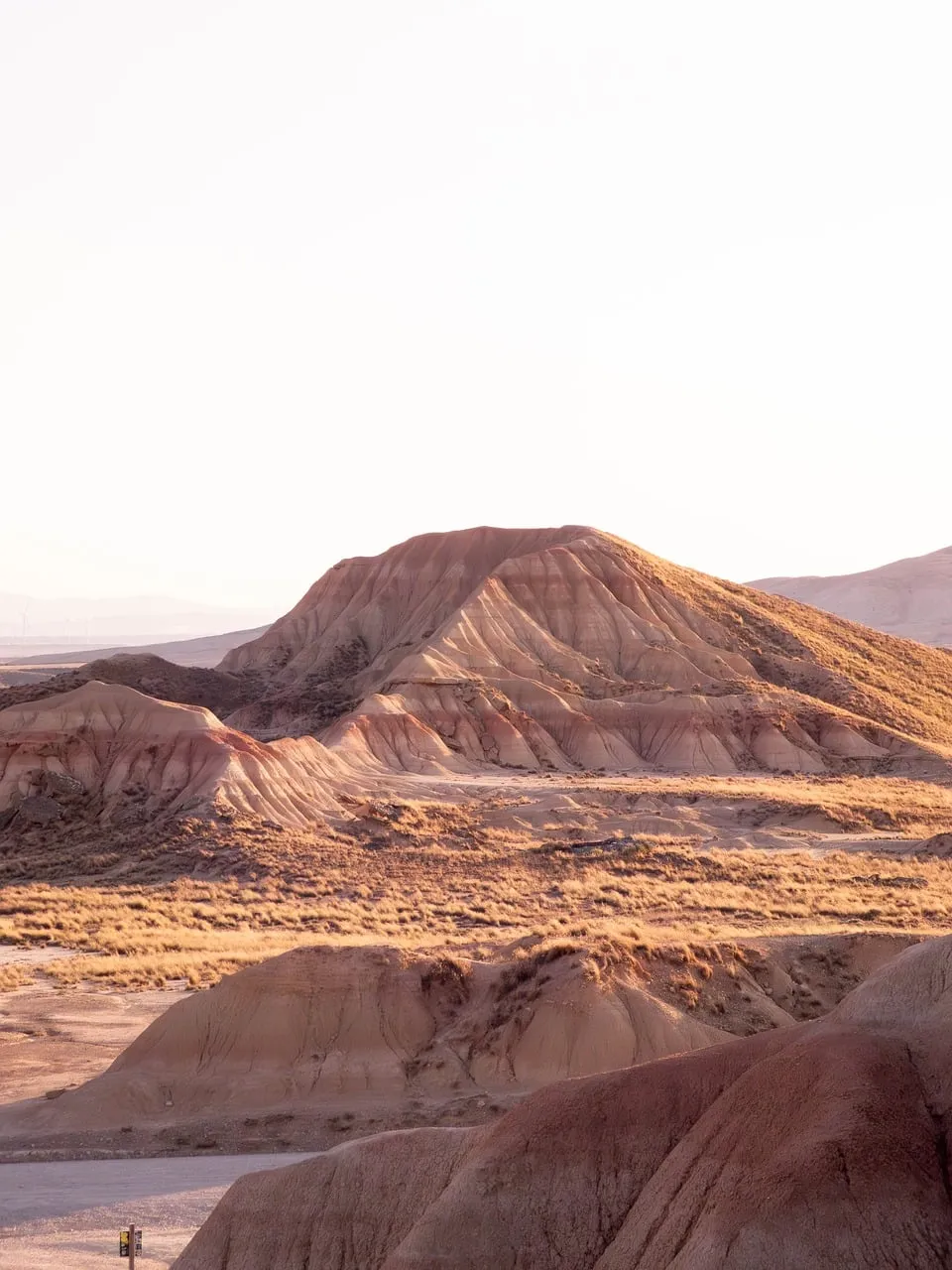 Breathtaking Desert Peaks Under Golden Sunset Hues