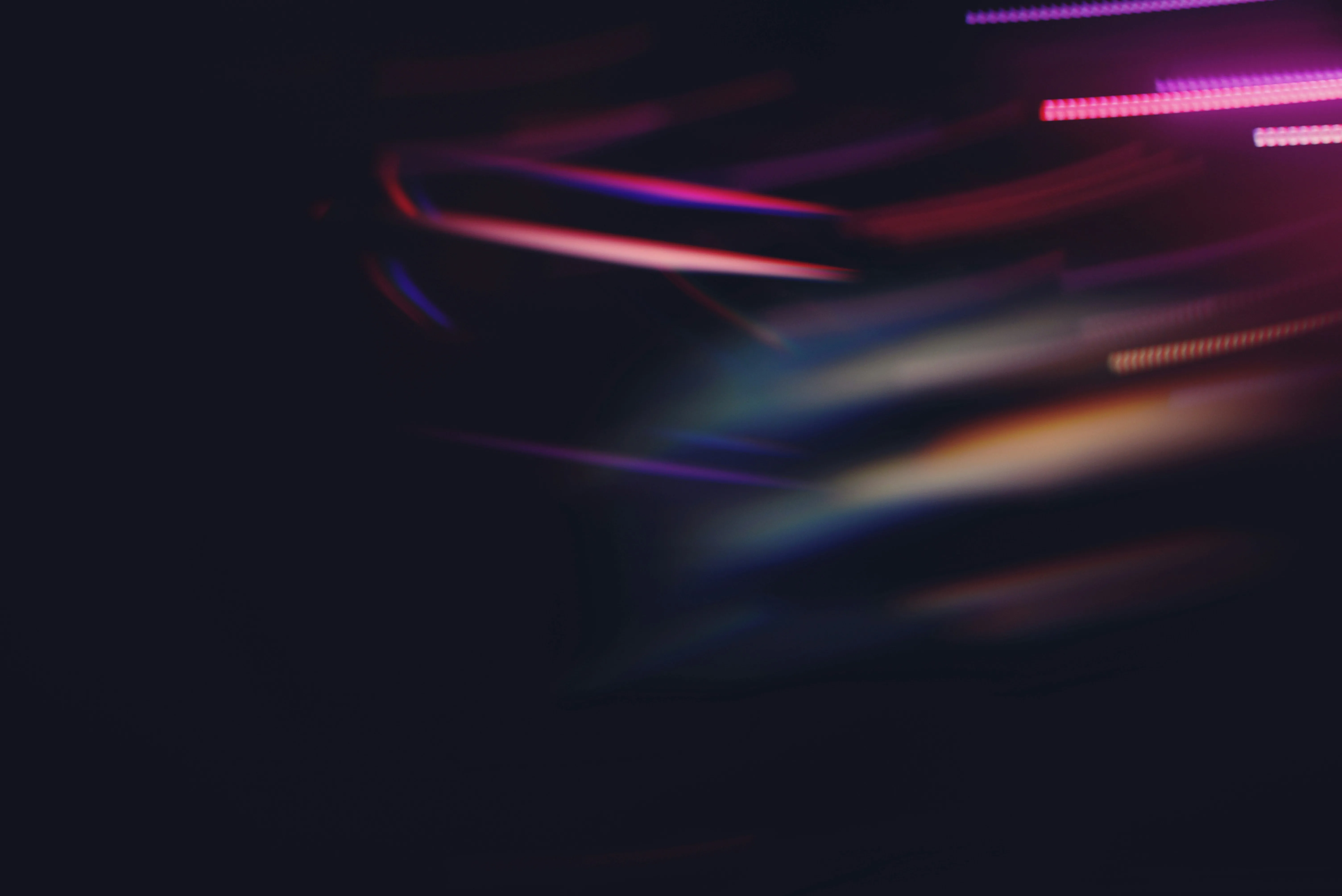 Vibrant Neon Streaks: Dynamic Abstract Light Trails