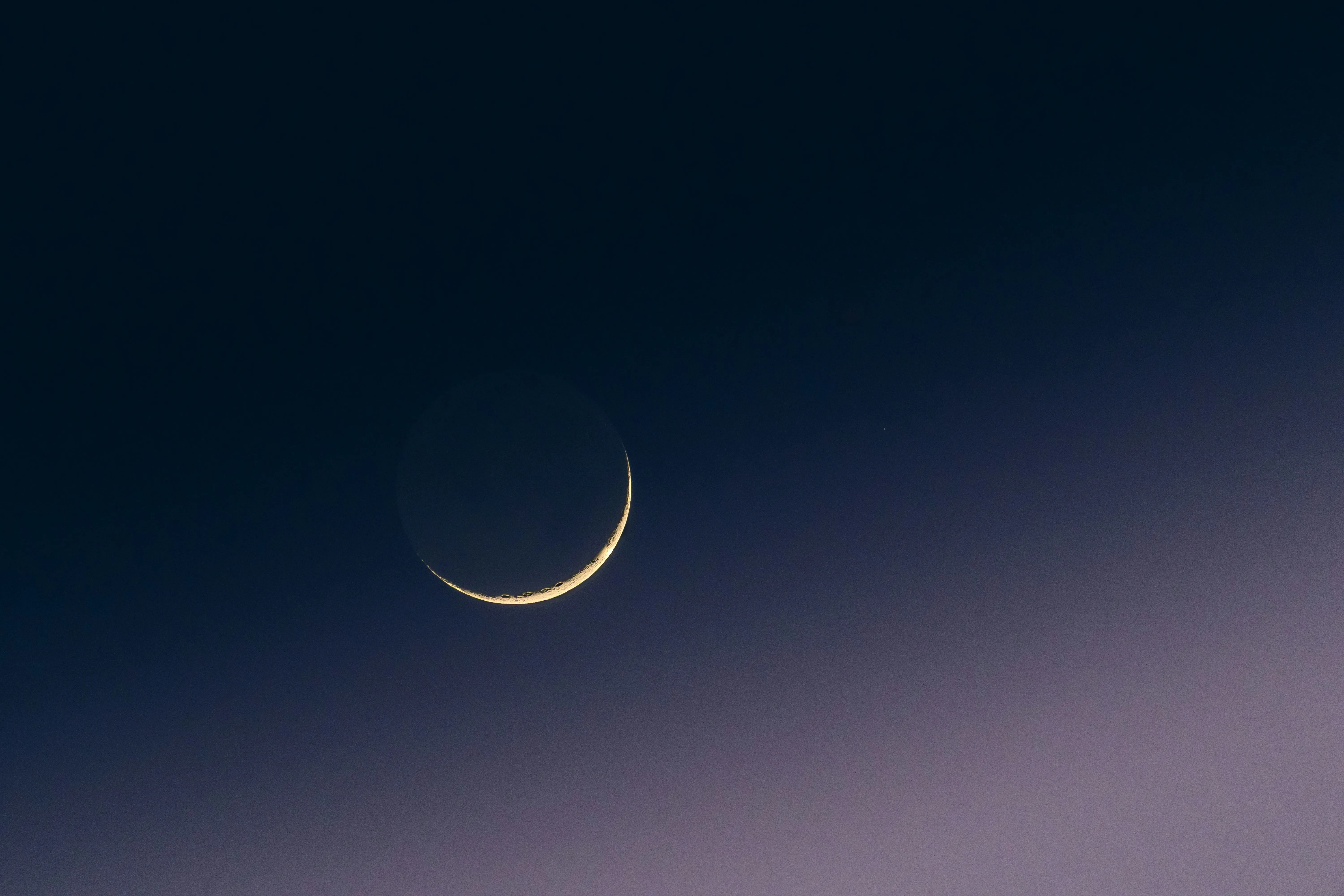 Enchanting Crescent Moon Gracing a Gradient Night Sky