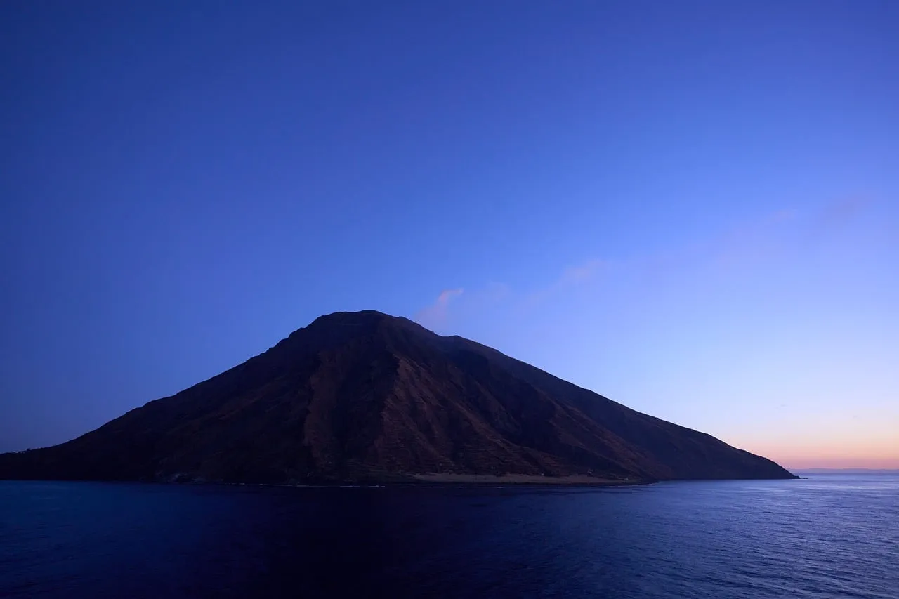 Mystical Stromboli: Volcano's Embrace at Twilight