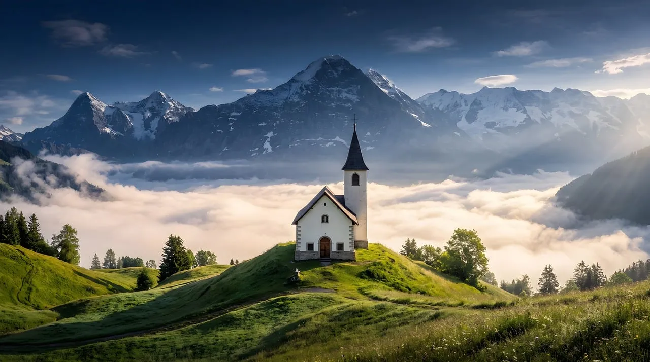 Breathtaking Alpine Dawn: Church Amidst Misty Mountains