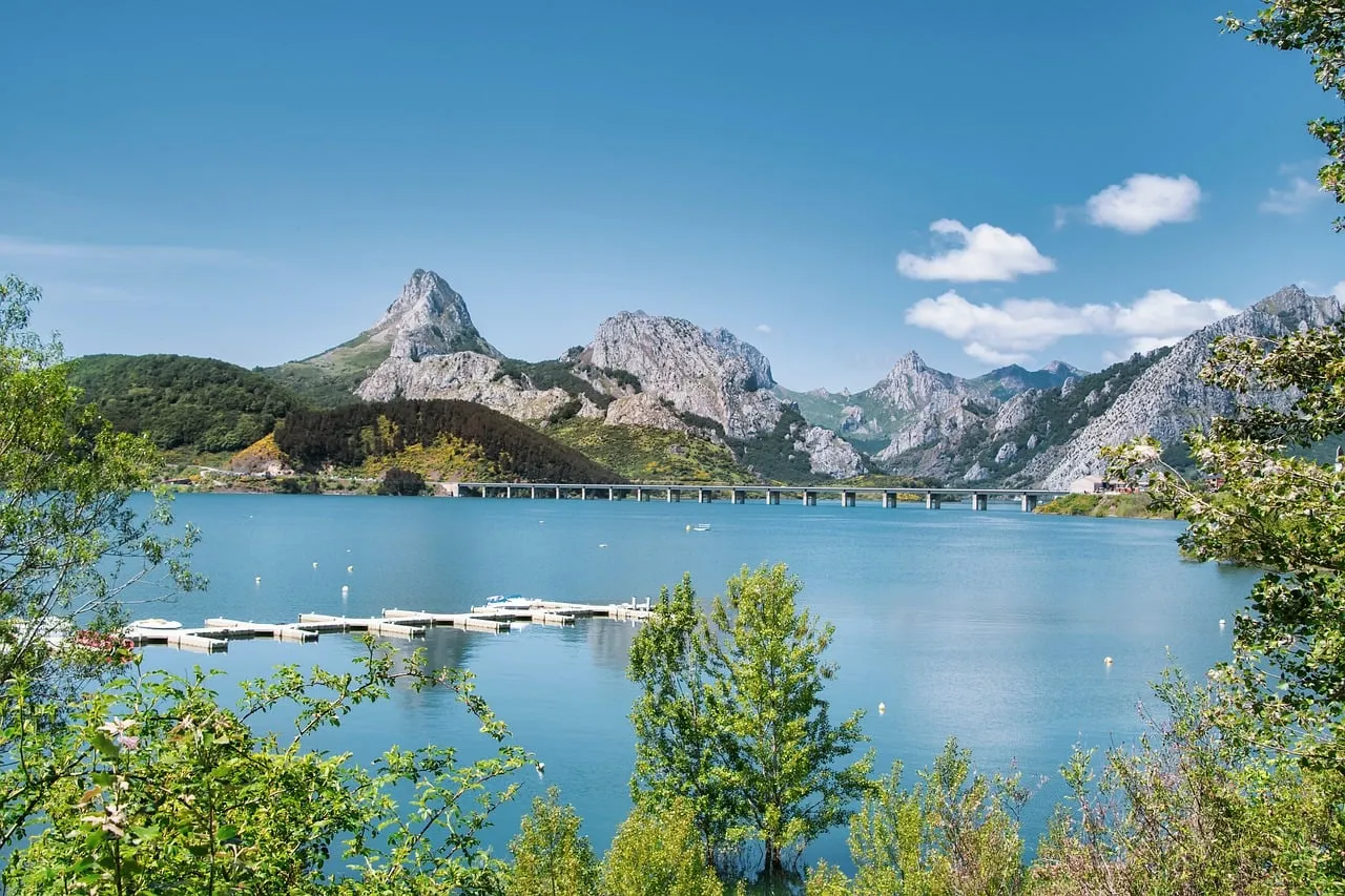 Breathtaking Spanish Lakeside Mountains Under Azure Skies