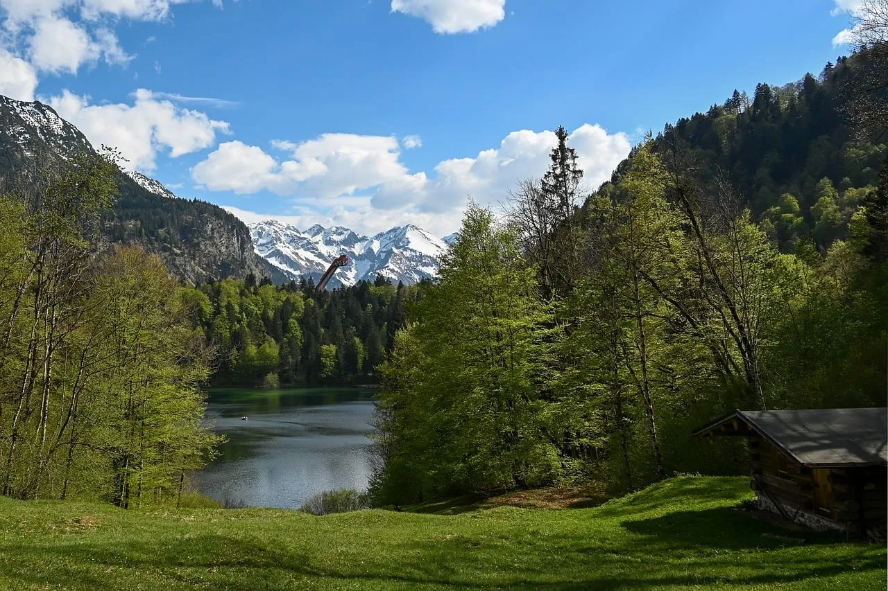 Breathtaking Alpine Panorama: Freibergsee's Serene Spring Beauty