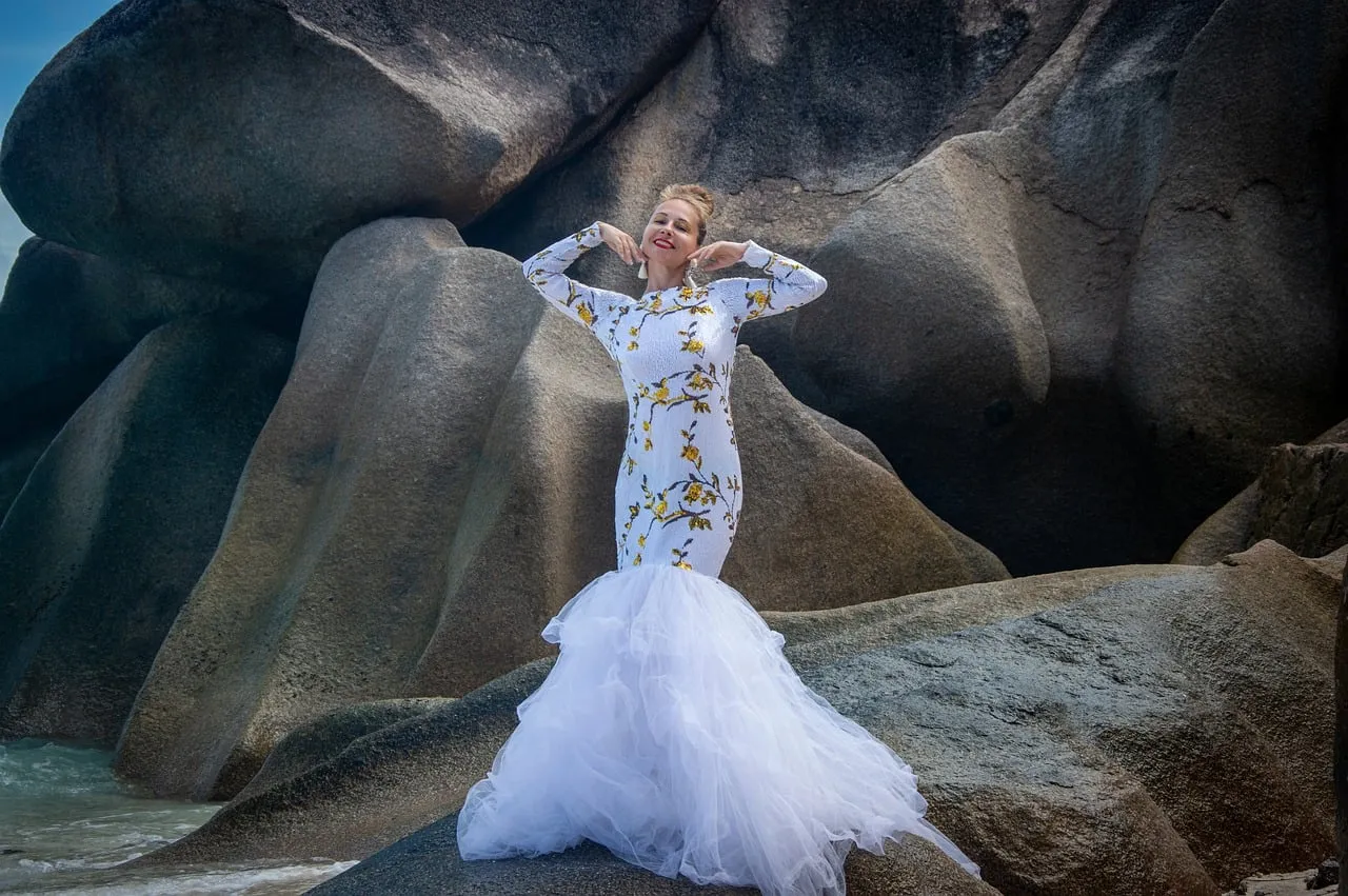 Stunning Bride Posing on Seychelles' Iconic Beach Boulders