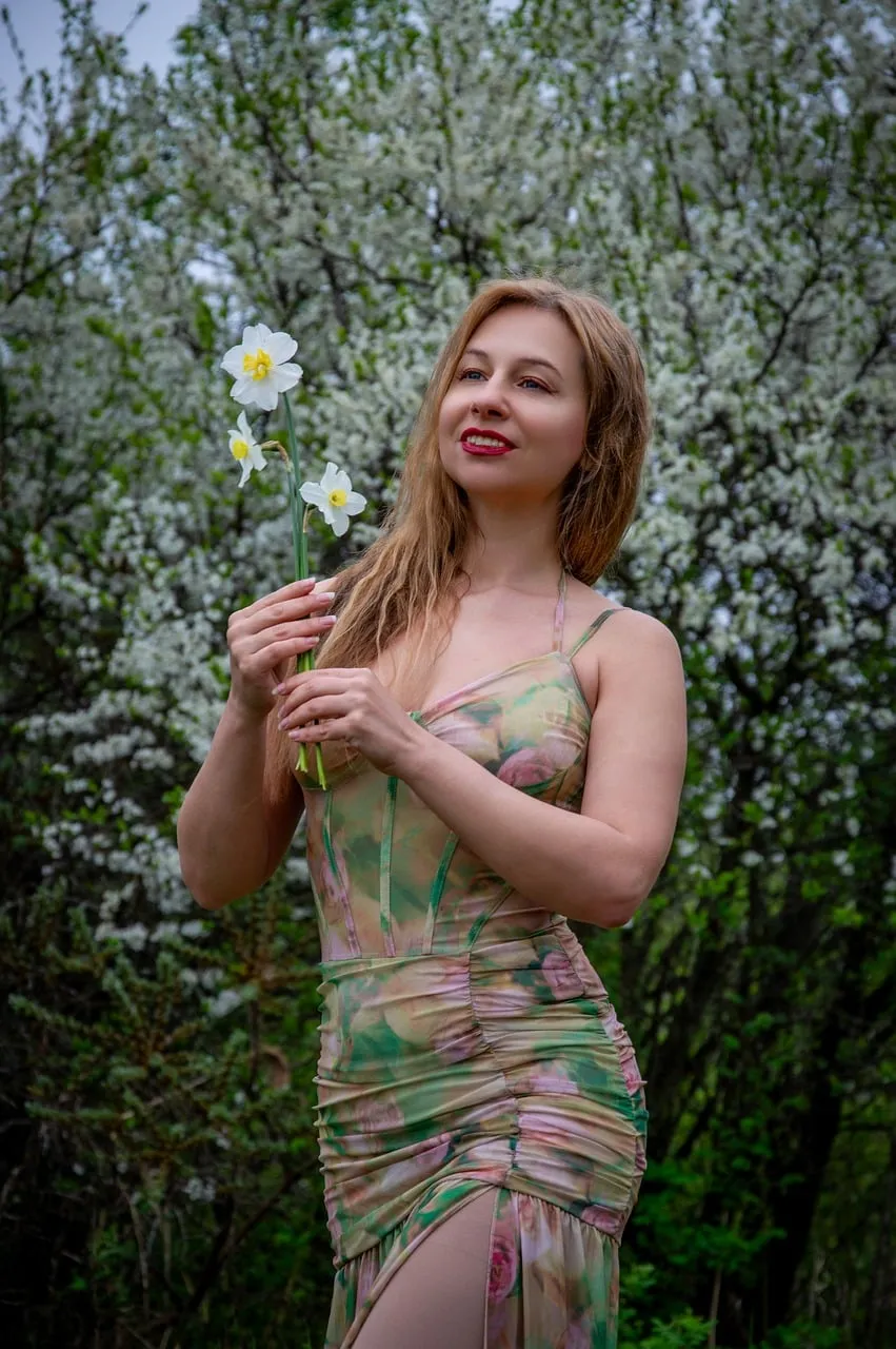 Enchanting Spring Blossom Portrait: Woman in Floral Dress