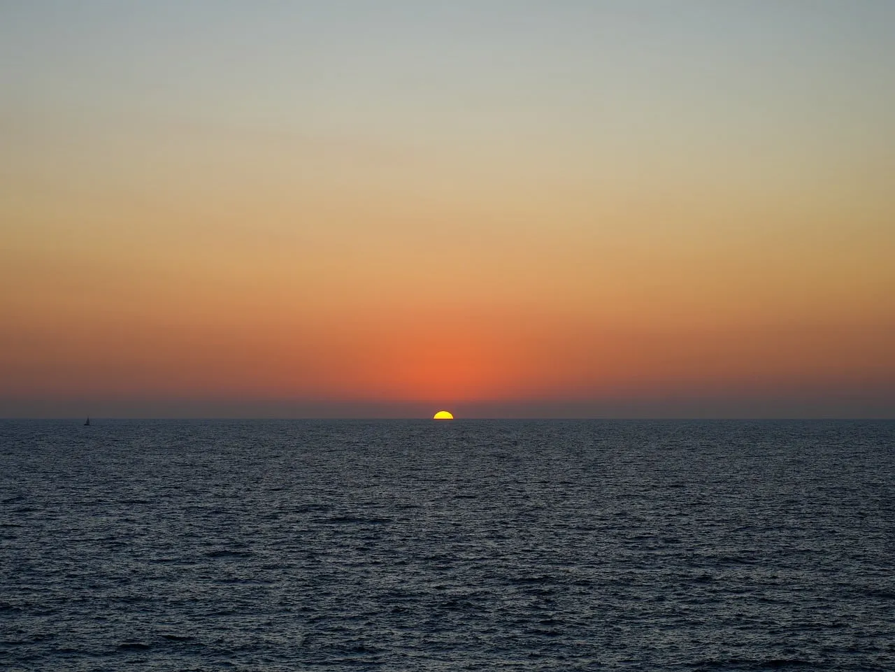 Breathtaking Mediterranean Sunset: Serene Ocean Twilight
