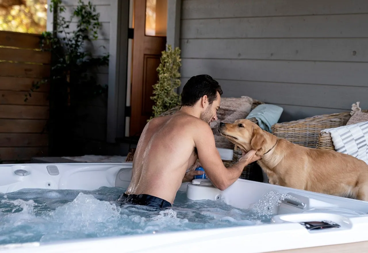 Relaxing Hot Tub Moment with Man and His Golden Retriever