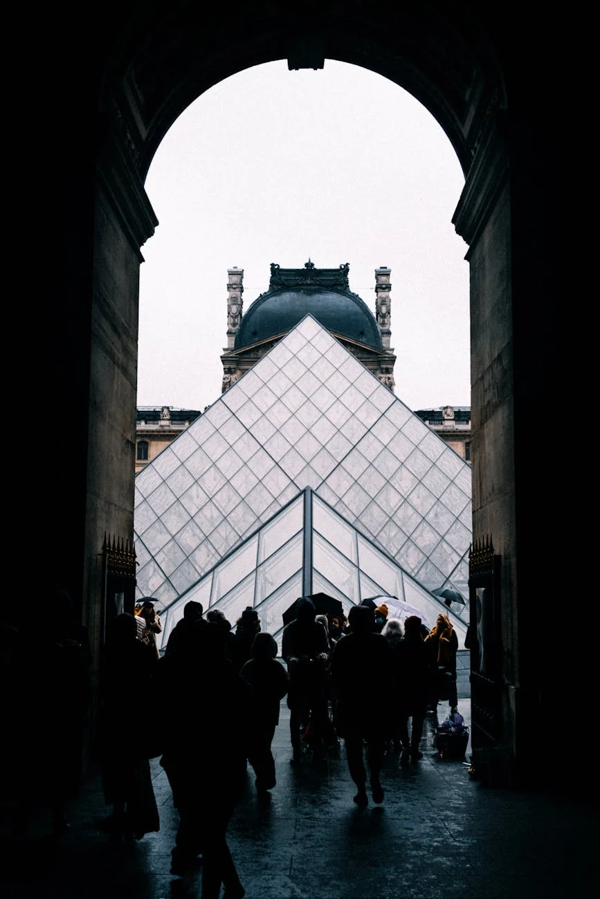 Iconic Louvre: Glimpse Through Parisian Archway