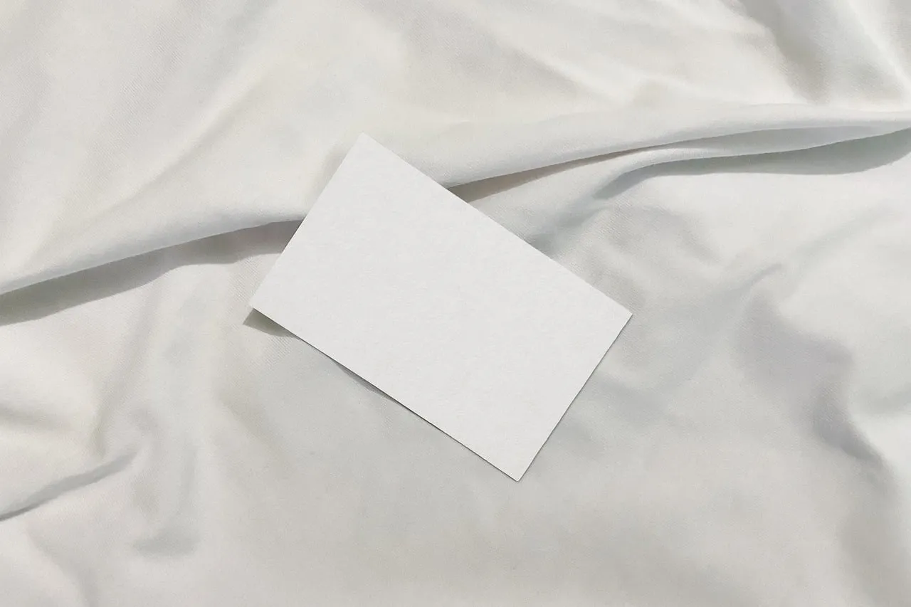 Stunning White Business Card Mockup on Fabric