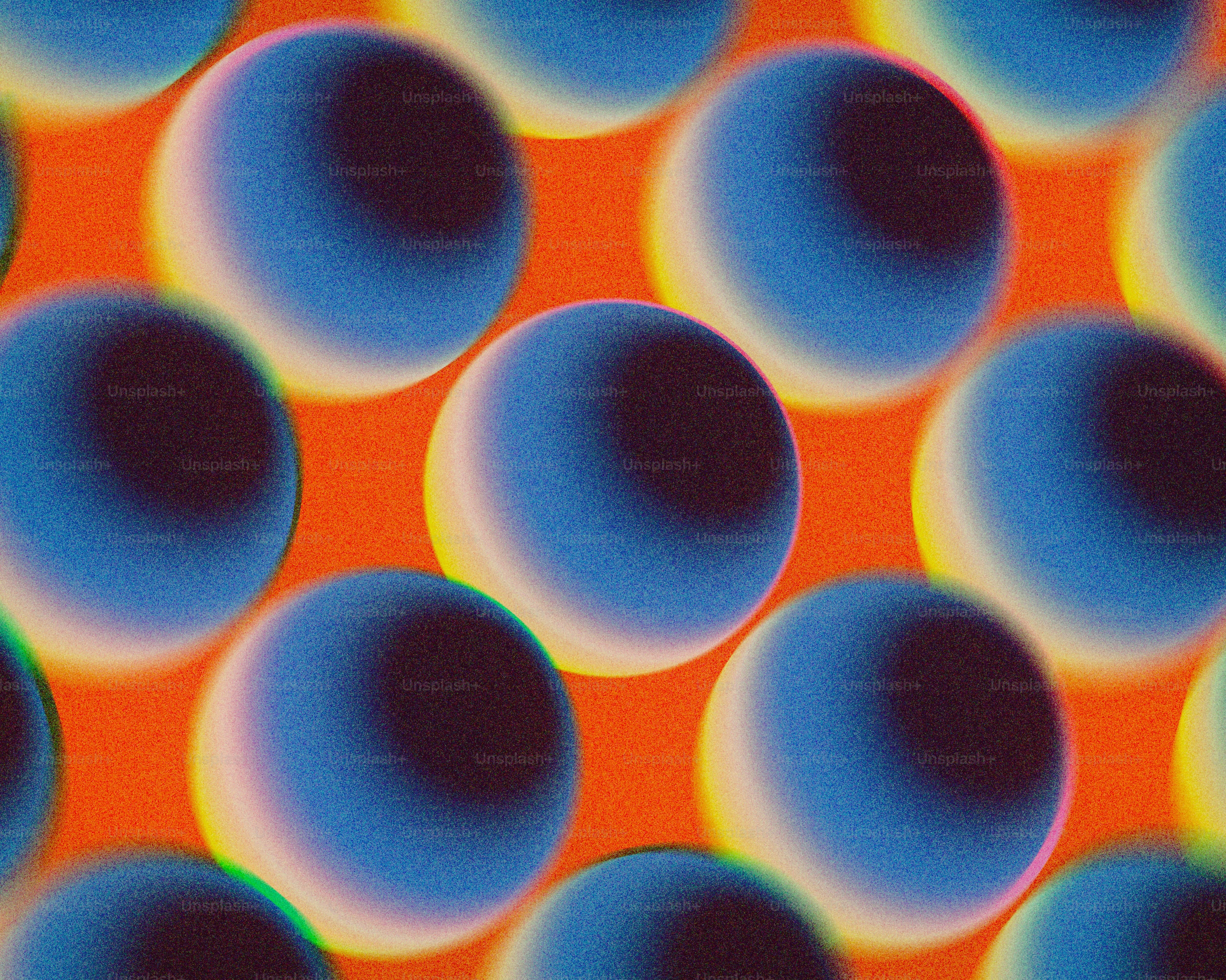 Vibrant Retro Wallpaper: Psychedelic Blue Orbs on Orange