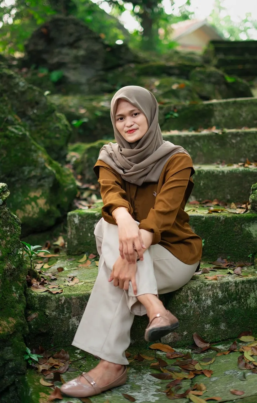 Serene Moment: Woman in Hijab Amidst Nature's Embrace