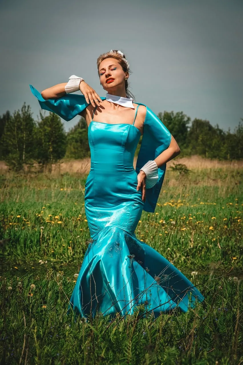 Enchanting Blue Gown in a Serene Summer Field