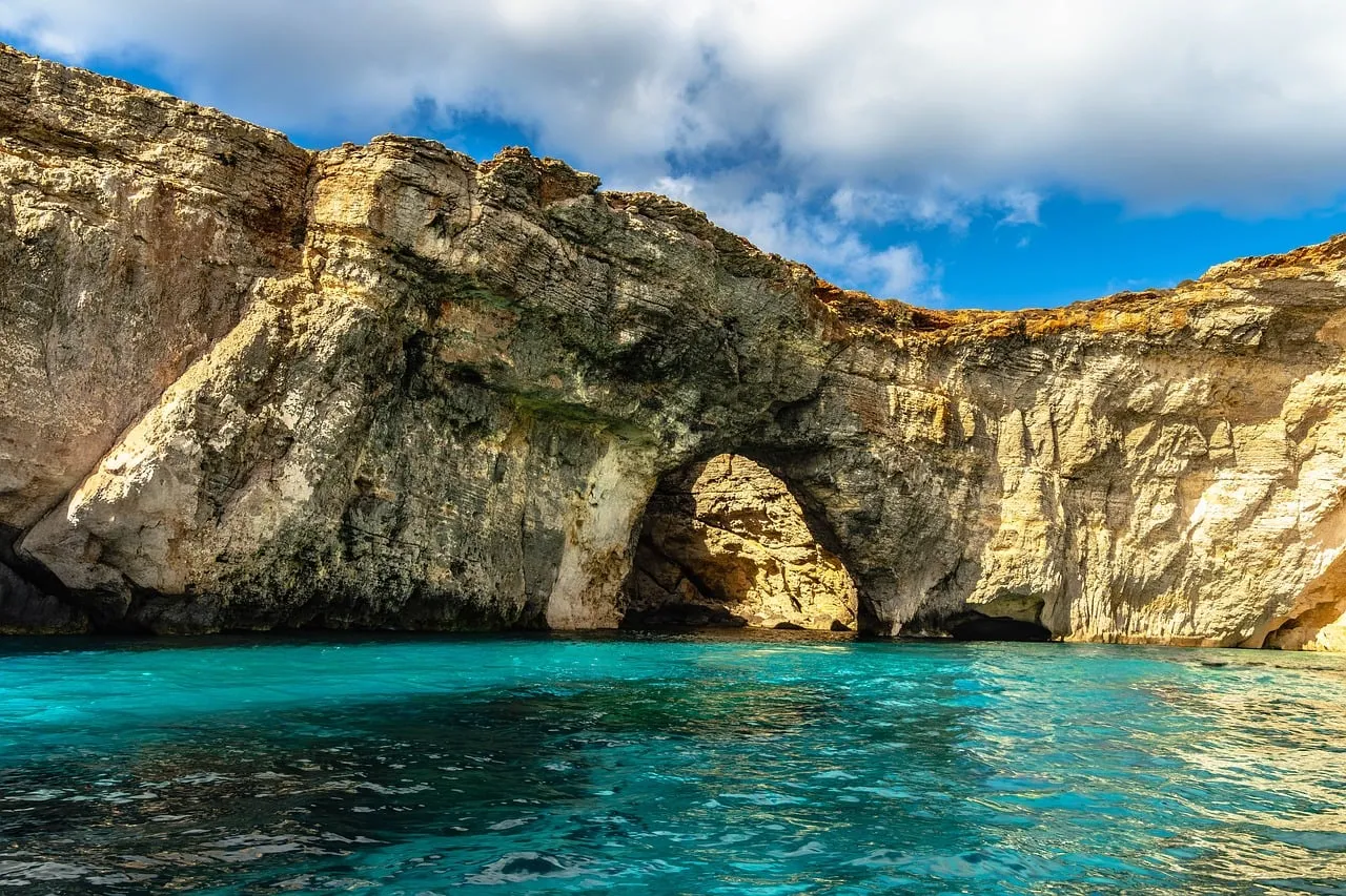 Azure Waters Under Malta's Majestic Sea Arch