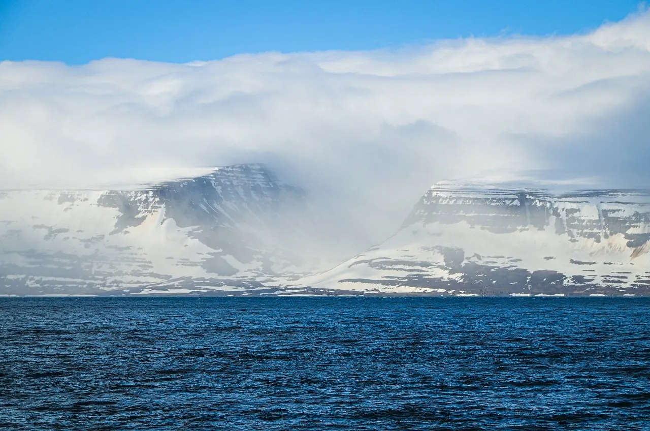 Breathtaking Arctic Fjord: Snow-capped Peaks & Serene Waters